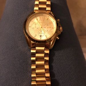 MichaelKors($350 new)   $55 : new battery aug 18